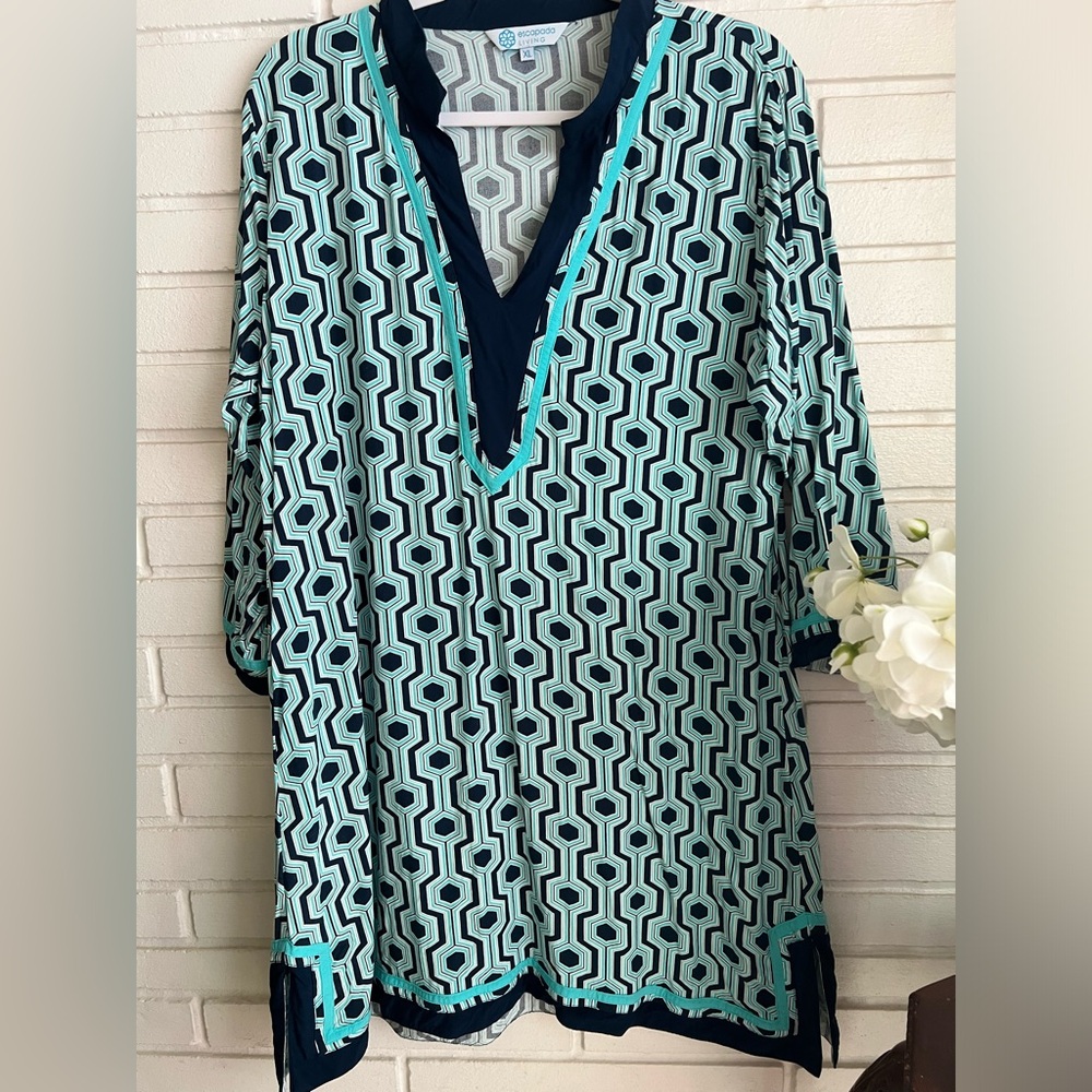 Beautiful versatile tunic dress. Vibrant colors soft material never worn.